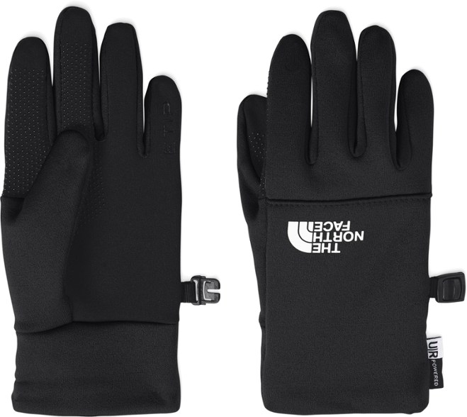 Eco-friendly kids hiking gloves showcasing their touchscreen capability in a snowy outdoor setting.