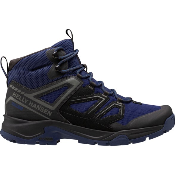 Stalheim HELLY TECH waterproof hiking boots showing side view on rocky trail