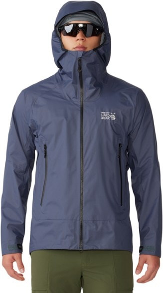 Front angle view of the men's ultralight waterproof jacket worn over alpine climbing gear.