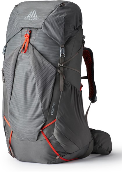 Gregory Facet 45 Women's backpack with a dynamic fit showcased on a hiking trail.