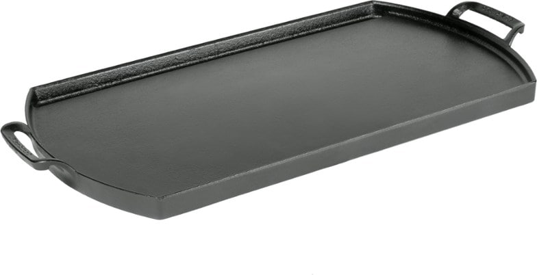 Lodge Blacklock Double Burner Cast Iron Griddle on a camping stove, ready for grilling.