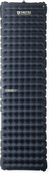 NEMO Tensor sleeping pad showcasing its insulation layers and thickness in winter camping setup.