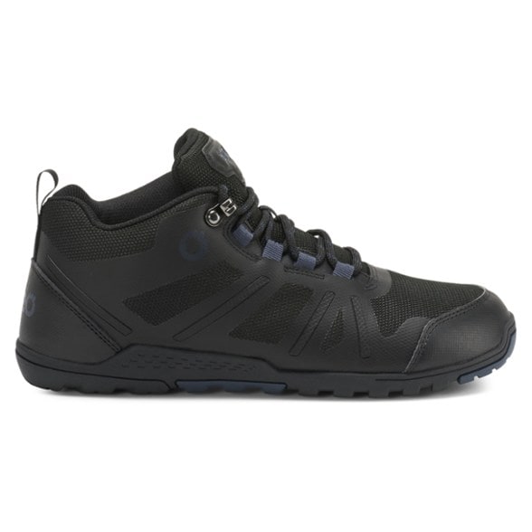Xero Shoes DayLite Hiker Fusion hiking boots showcasing the sleek design and grip on rocky terrain.