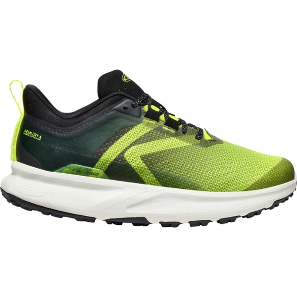 Side view of KEEN 450 Dirt Pro Waterproof Hiking Shoes for Men on a hiking trail.