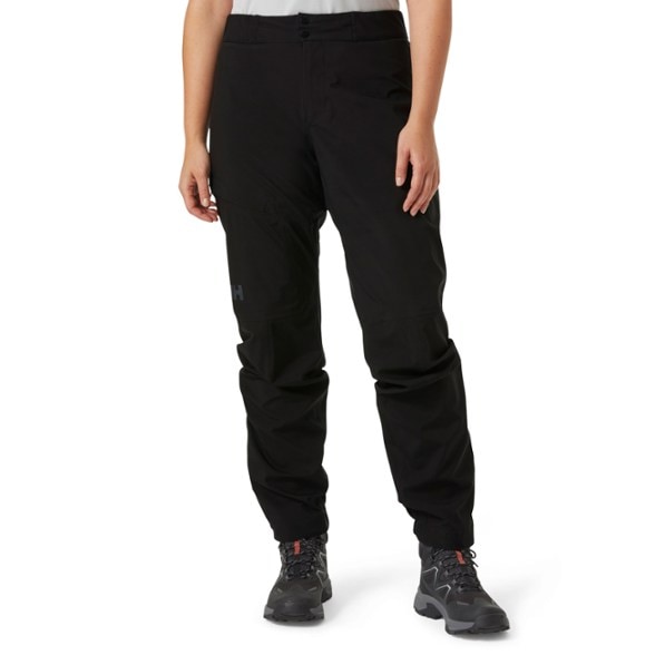 Side view of Summit Pro Women's Breathable Shell Pants demonstrating their fit and design.