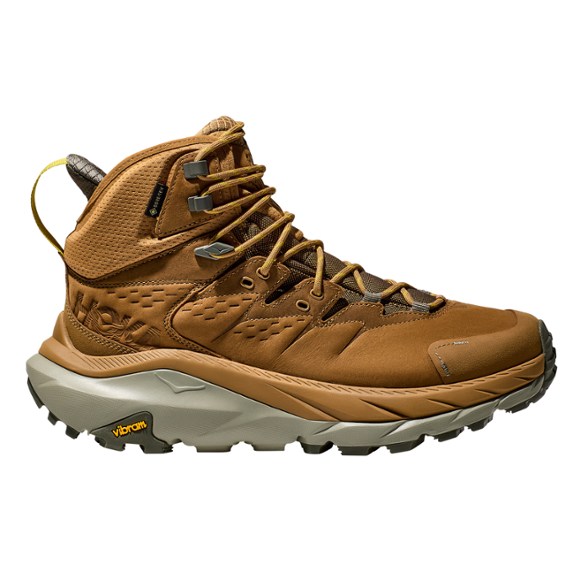 Side view of Kaha 2 GTX Men's Hiking Boots on rocky terrain.