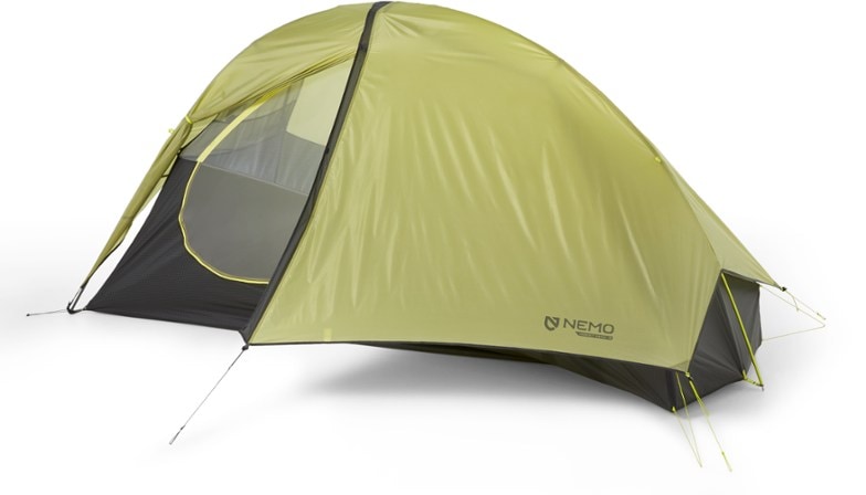 NEMO Hornet OSMO tent set up in a scenic mountain landscape, showcasing its spacious interior.
