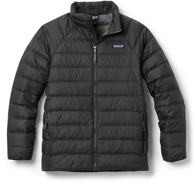 Patagonia Kids' Down Jacket in action during a winter hike, showcasing warmth and style.