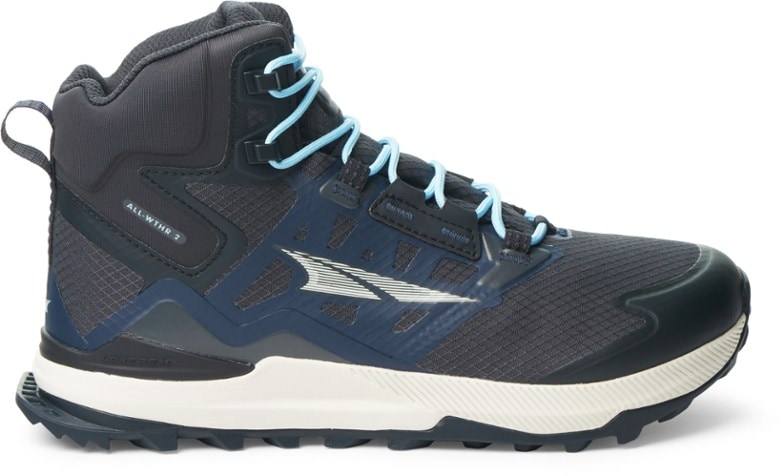 Side view of Altra ALL-WTHR Mid 2 women's hiking boots on rocky terrain.