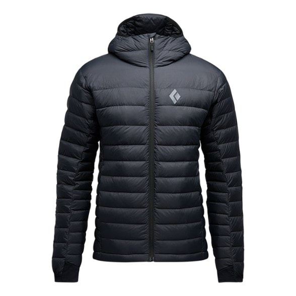 Black Diamond Access Down Hoodie in action on a hiking trail, showcasing its stylish yet functional design.
