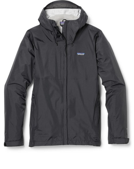Patagonia Torrentshell 3L men's waterproof jacket showcasing its packable design in a hiking setting.