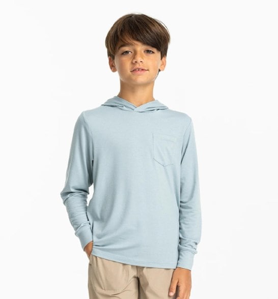 Sun Shield Kids' Hoodie in action outdoors, perfect for hiking and exploring.