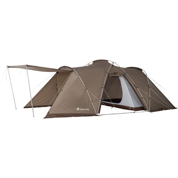 Snow Peak Land Nest tent set up in a picturesque camping site, perfect for family adventures.
