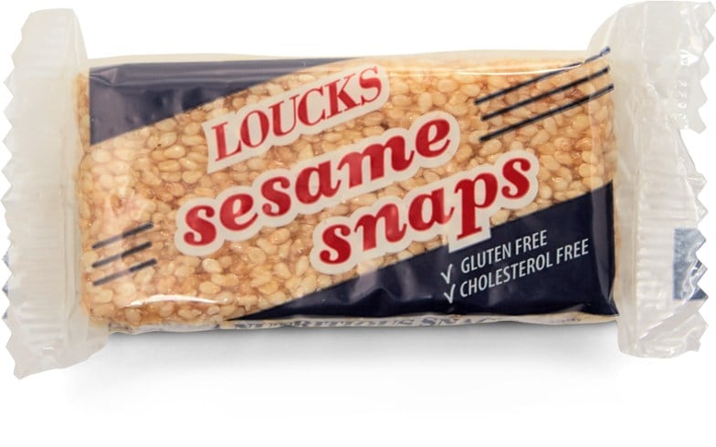 Close-up view of Nutty Sesame Crunch Bars with a rustic background, highlighting their crunchy texture.