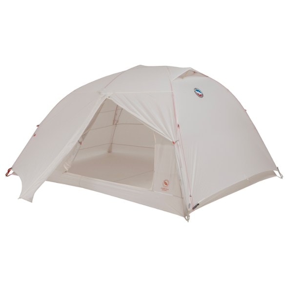 Big Agnes Copper Spur Limited 3 tent set up in a lush forest, highlighting its spacious interior and unique colorway.