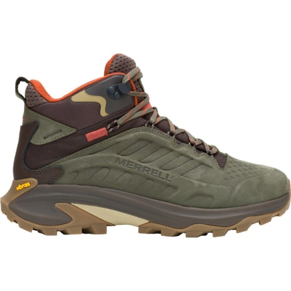 Close-up side view showing the waterproof molded leather upper and Vibram outsole traction pattern