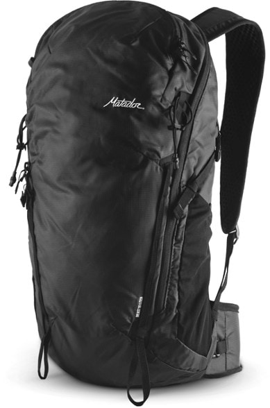 Matador Beast 18 Technical Backpack on a hiking trail showcasing its lightweight design.
