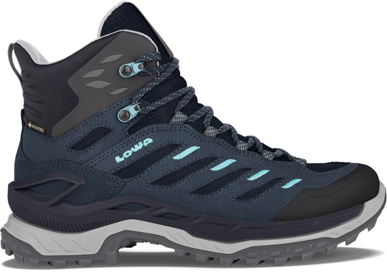 Side view of Lowa Innovo GTX mid hiking boots showcasing durable split leather and fabric upper with waterproof GORE-TEX membrane