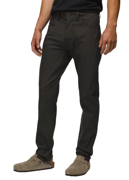 Side view of PrAna Brion Slim Fit Outdoor Pants demonstrating durable fabric and slim fit, perfect for hiking.