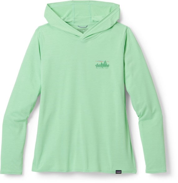 Patagonia Women's Quick Dry Capilene Hoody on a model in the outdoors, showcasing its fit and style.