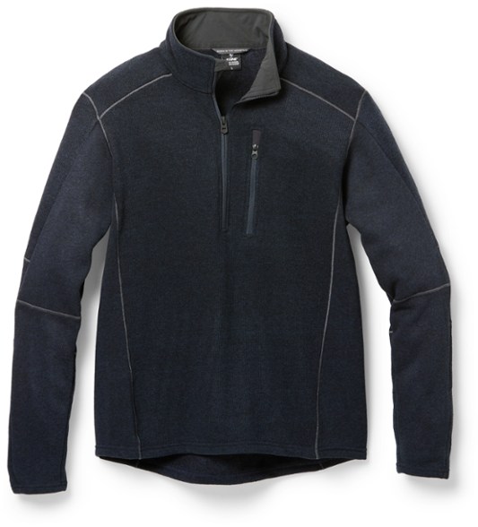 Front view of the KUHL quarter-zip fleece sweater showcasing its stylish design and thumb loops.