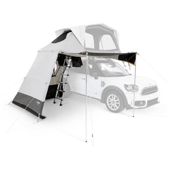 Dometic RT Awning S Low setup with roof top tent providing shade for a car camping site.
