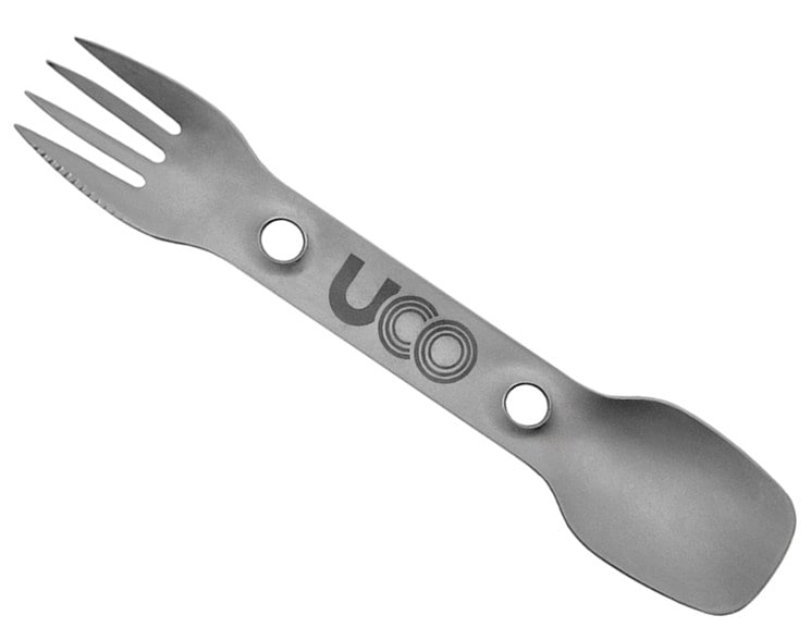 Titanium spork with serrated edge for easy cutting during outdoor meals.