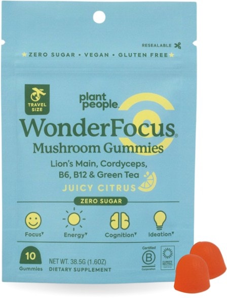 FocusFuel Mushroom Gummies with a citrus flavor and brain-boosting ingredients on a wooden table.