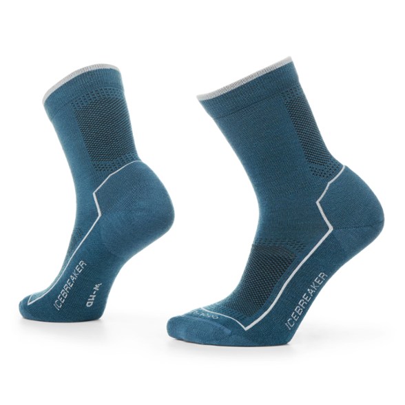 Close-up of Cool-Lite ultralight merino wool hiking socks on a rocky trail