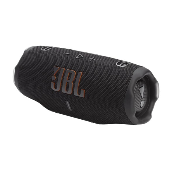 JBL Charge 6 Bluetooth speaker on a picnic table with friends enjoying music.