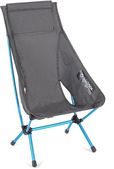 Helinox UltraLite Highback lightweight chair fully assembled on forest trail