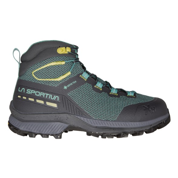 Women's waterproof hiking boots viewed from the side showing lace-up mountaineering-style fit