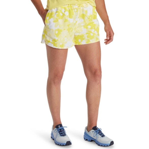Juniper Springs women's hiking shorts shown on a sunny trail, highlighting quick-drying fabric.