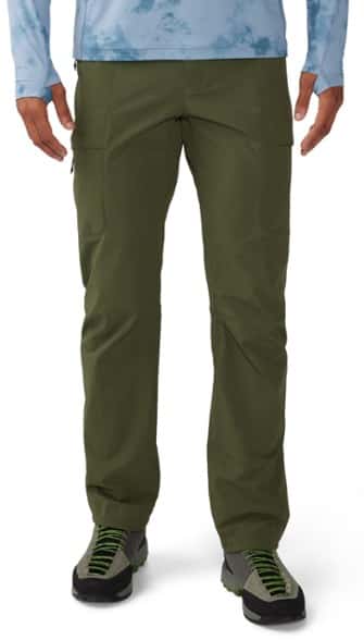 Front view of Chockstone LT men's alpine pants on a rocky trail, showcasing their lightweight design and mobility.