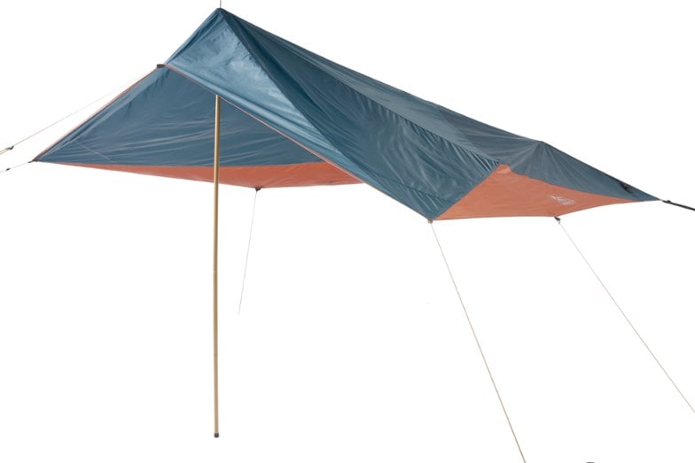 Waypoint Vehicle Shelter Tarp set up next to a camping car, providing shade and rain protection.