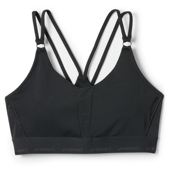 Brooks Elevate Plunge 3.0 sports bra in action during a run, showcasing its stylish design and crisscross straps.