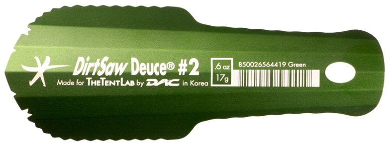 DirtSaw Deuce #2 trowel angled view, showing serrated teeth and flared handle for grip.