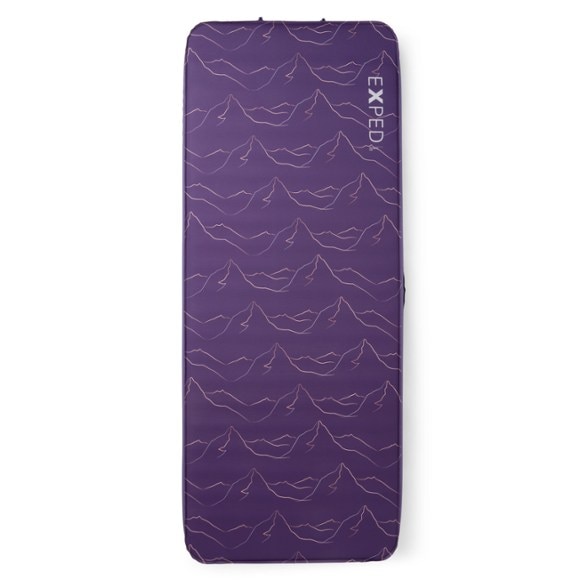 TrailRest MaxComfort foam sleeping mat fully inflated in a forest campsite setup