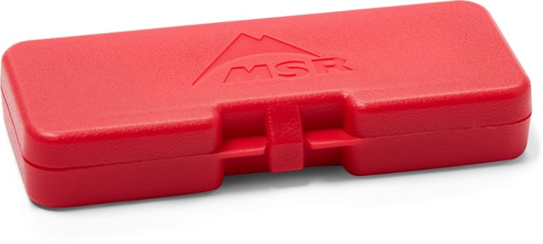 MSR XGK stove maintenance kit displayed with tools and parts inside a durable carrying case.