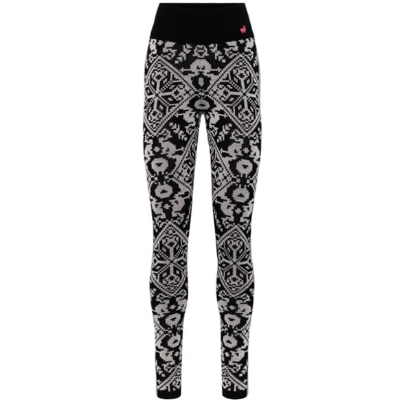 Side view of Kari Traa Women's Merino Wool Base Layer Pants with high waist for winter sports.