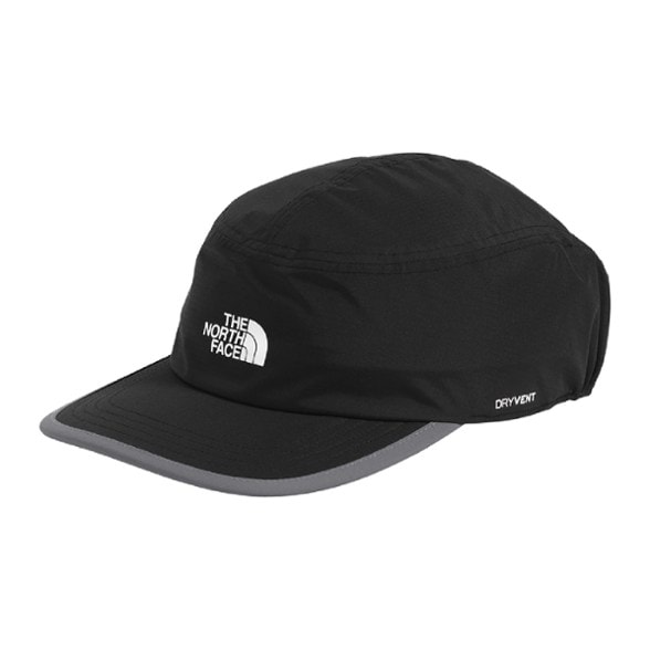 Eco-Friendly Antora rain hat worn during a hiking adventure under rainy skies.