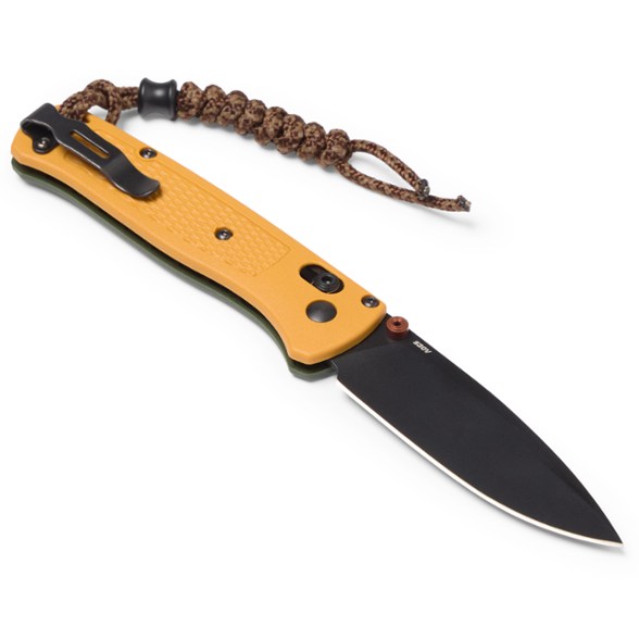 Benchmade Bugout knife displayed in an outdoor setting, showcasing its drop-point blade.