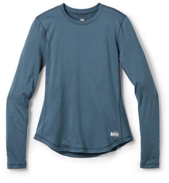 Eco-friendly women's long sleeve active top showcasing its moisture-wicking fabric and stylish design.