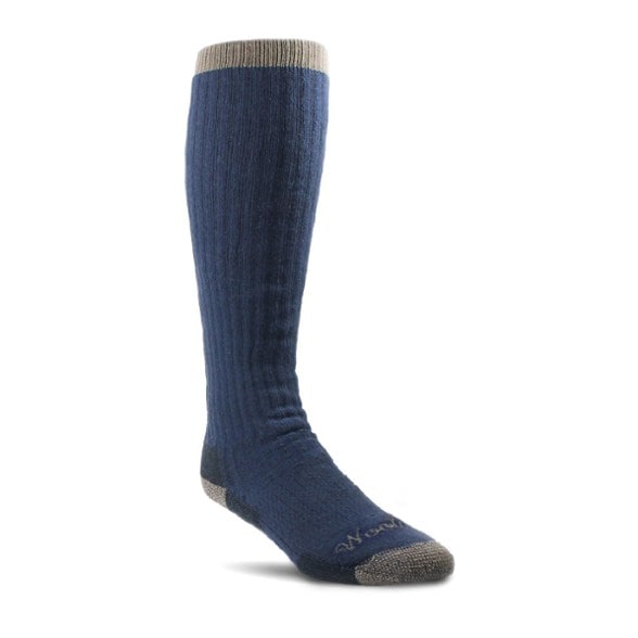 Over-the-calf merino wool hiking socks showing cushioning and fit.