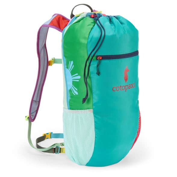Front view of the Cotopaxi TrailBright 24L Daypack showing unique patchwork colors and ripstop nylon texture