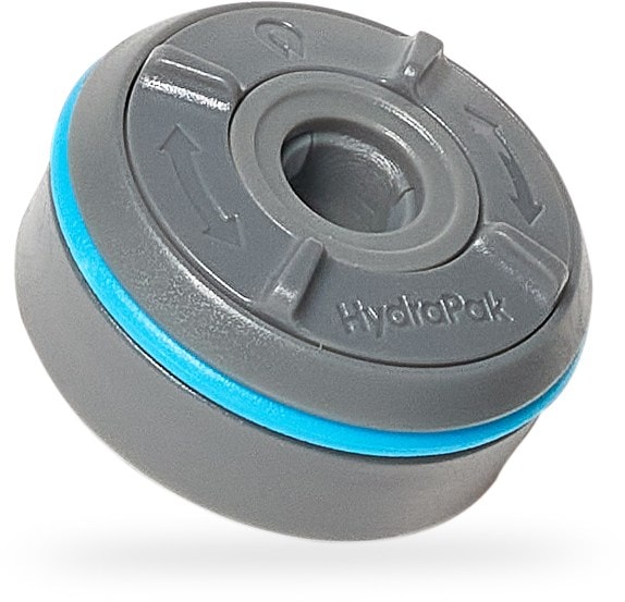 HydraPak Plug-N-Play cap connected to water bottle at campsite.