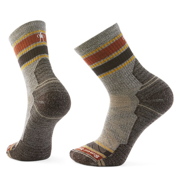 Men's merino wool hiking socks with light cushioning in outdoor setting