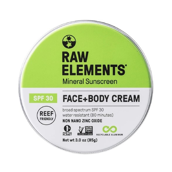 Eco-friendly sunscreen tin showcasing the product's recyclable packaging.