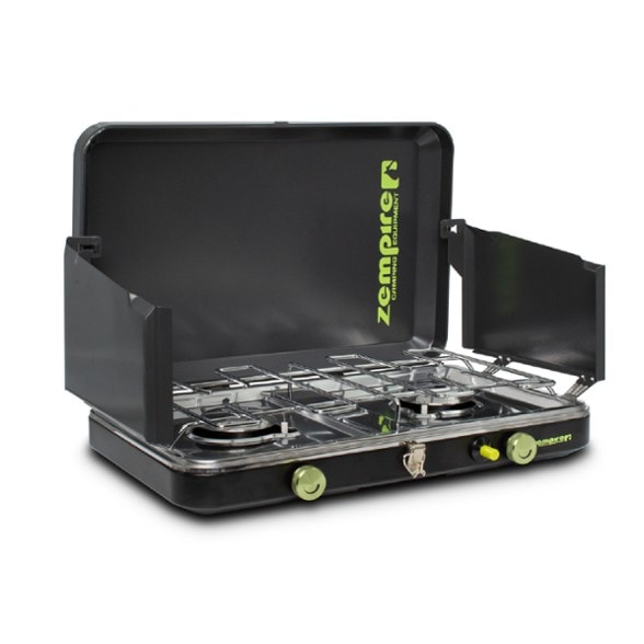 Zempire Deluxe 2-Burner Stove with flames cooking at a campsite