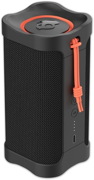 Terrain Pro Bluetooth speaker showcasing outdoor use at the beach, highlighting its waterproof feature.
